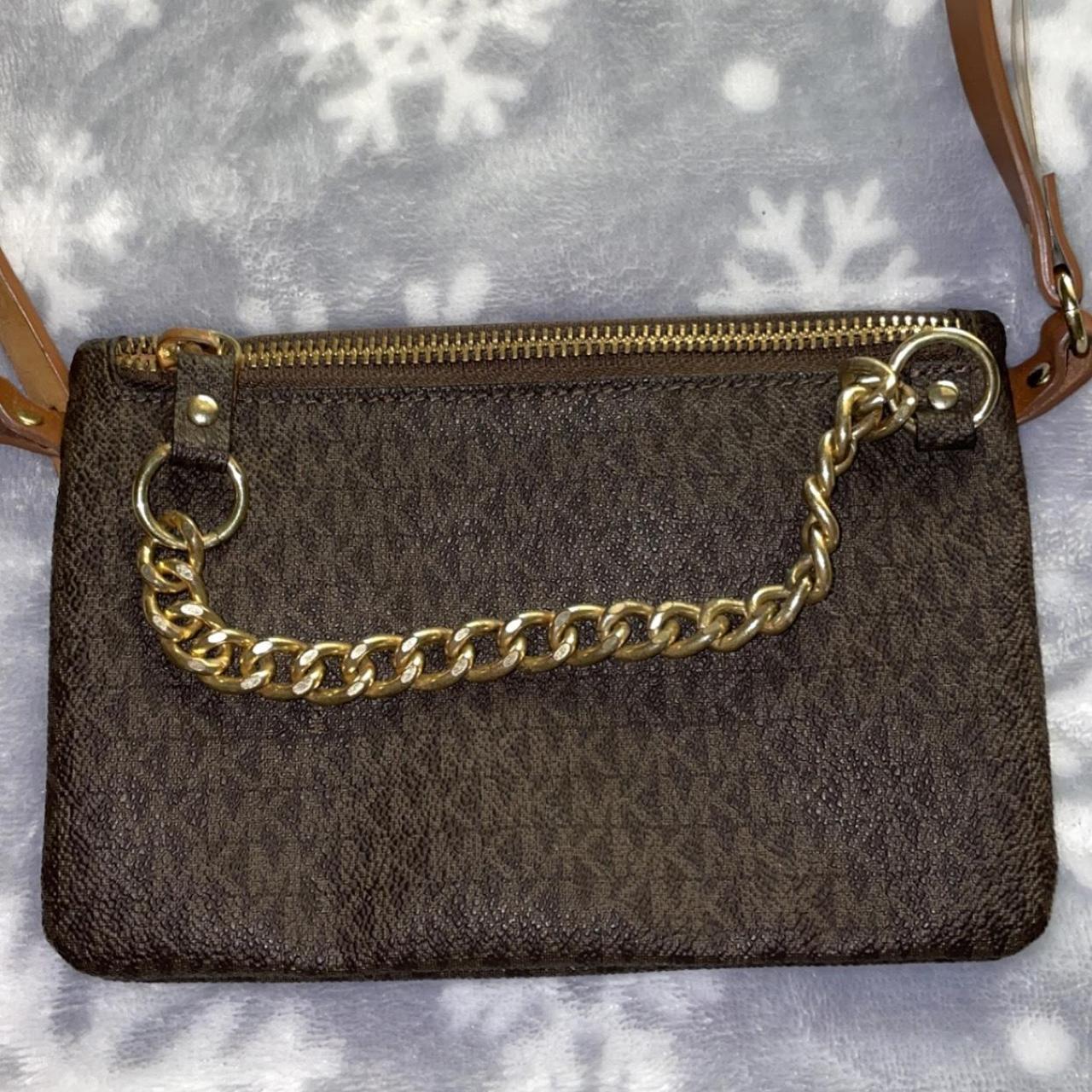 Michael kors wallet with strap and chain. Cute. Worn