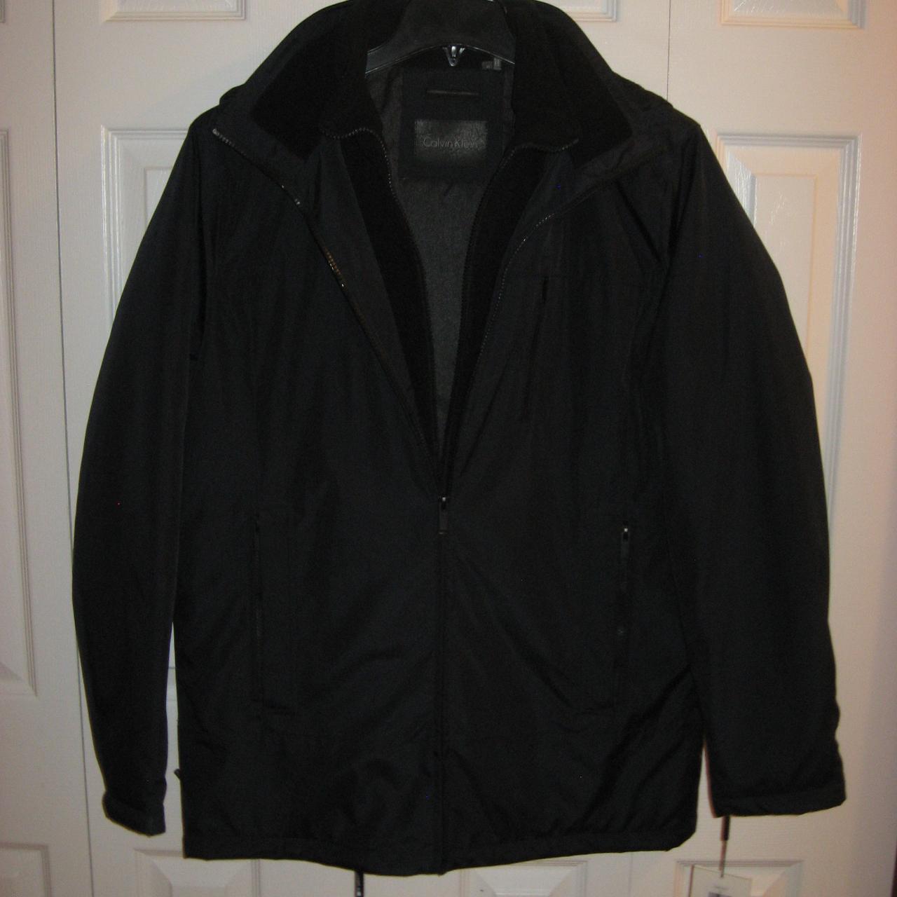 Calvin klein coat deals tag on sleeve