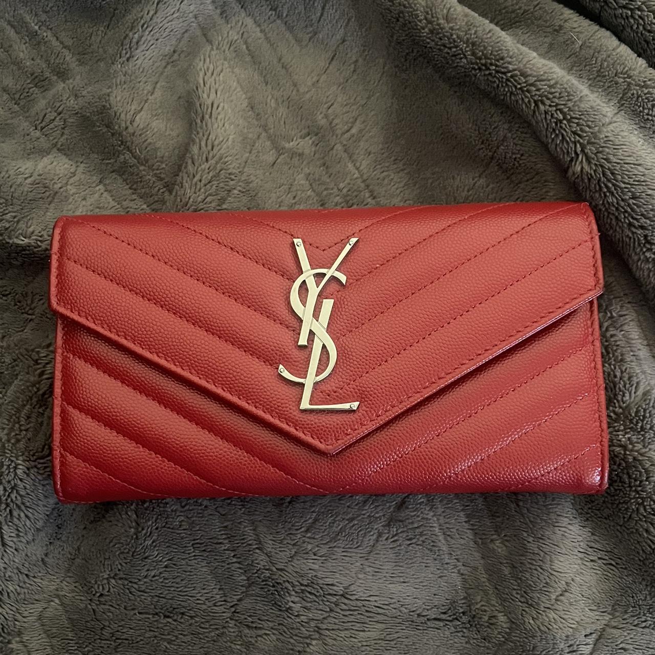 YSL red large wallet lightly used. This was from a Depop