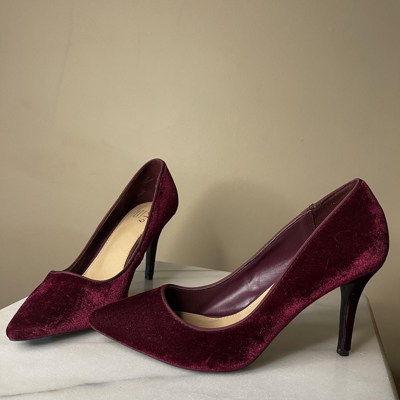 Burgundy velvet heels with a pointed toe and