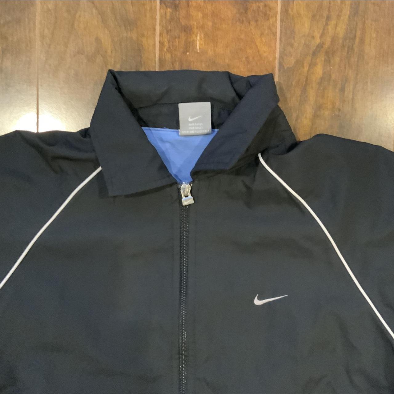 Vintage 2000s nike trackjacket with light blue... Depop