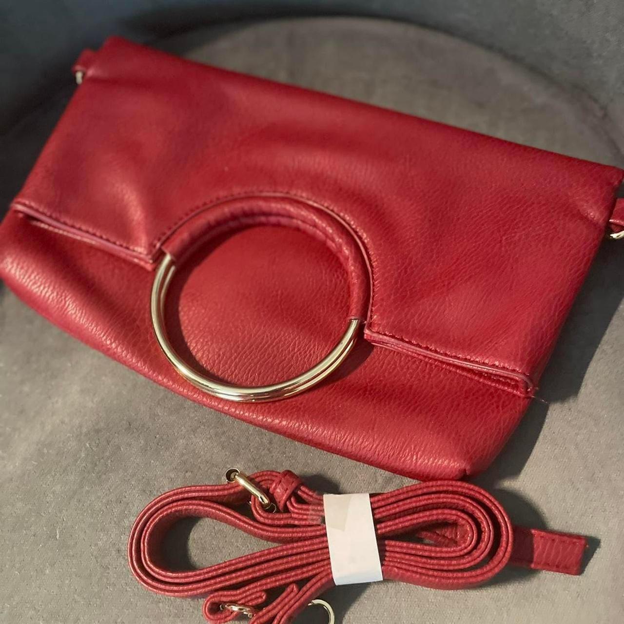 Burgundy clutch with gold ring handles, comes with... - Depop