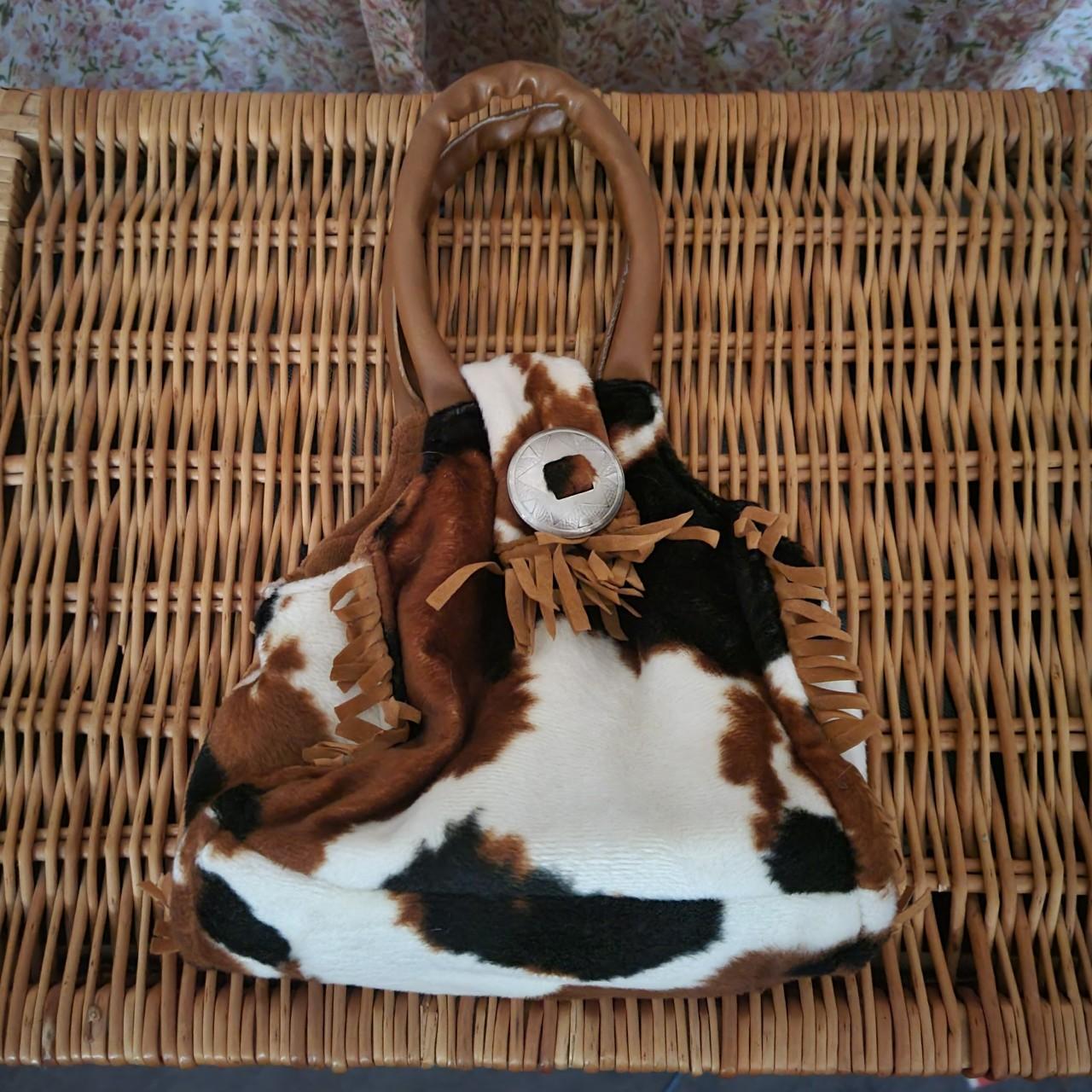 small cow print purse with fringe and a silver - Depop