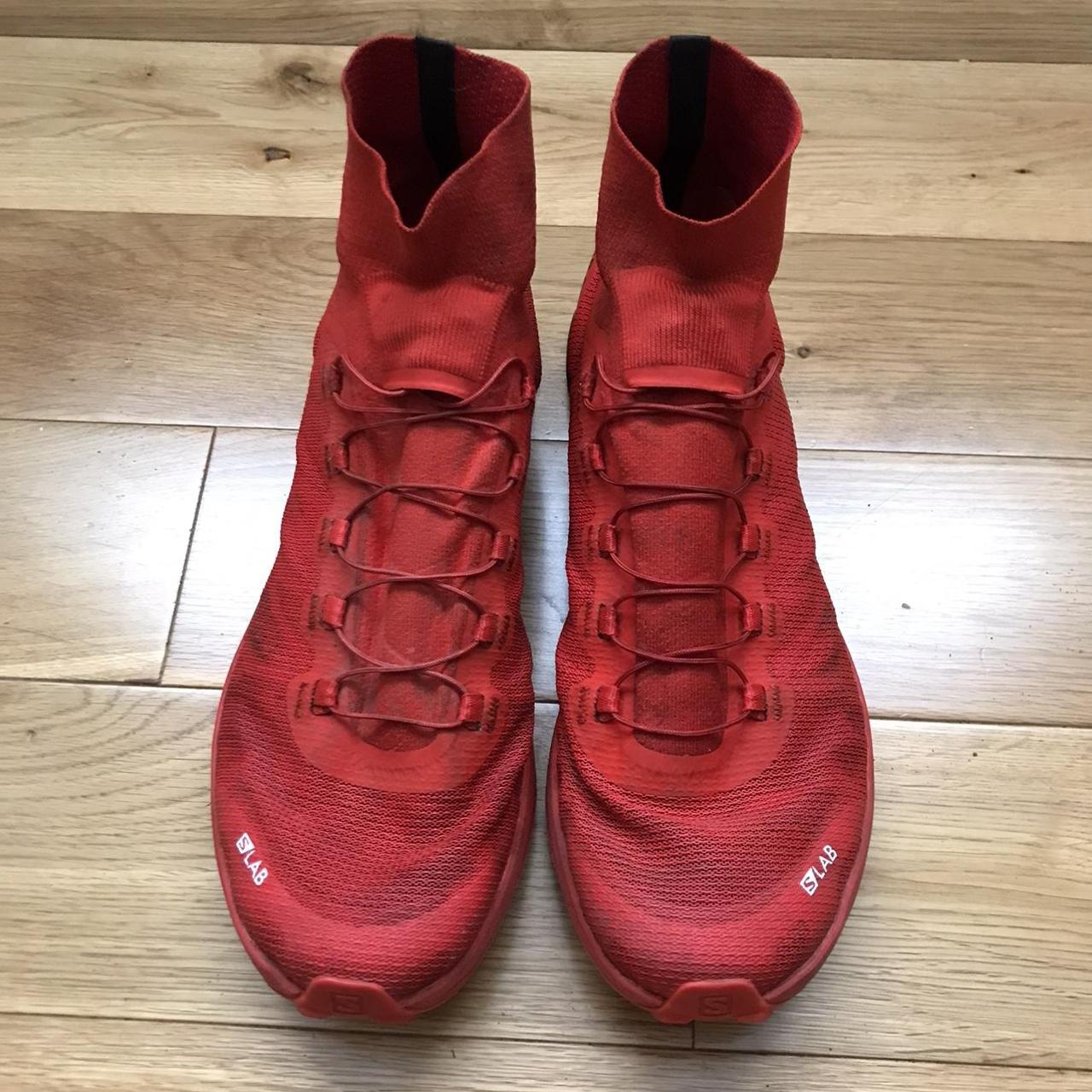 salomon red trainers
