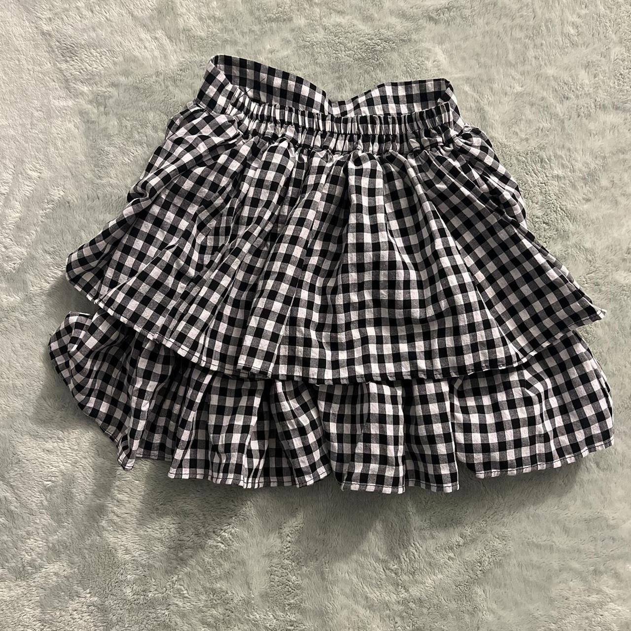 Black and white layered Mini Skirt May run... - Depop