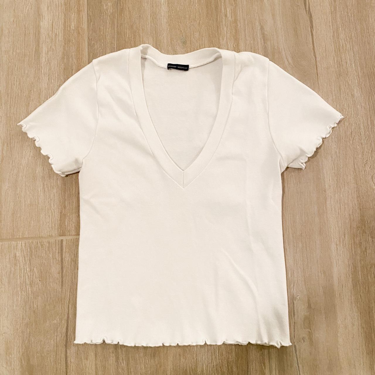 White tight shirt. From brandy Melville Worn - Depop