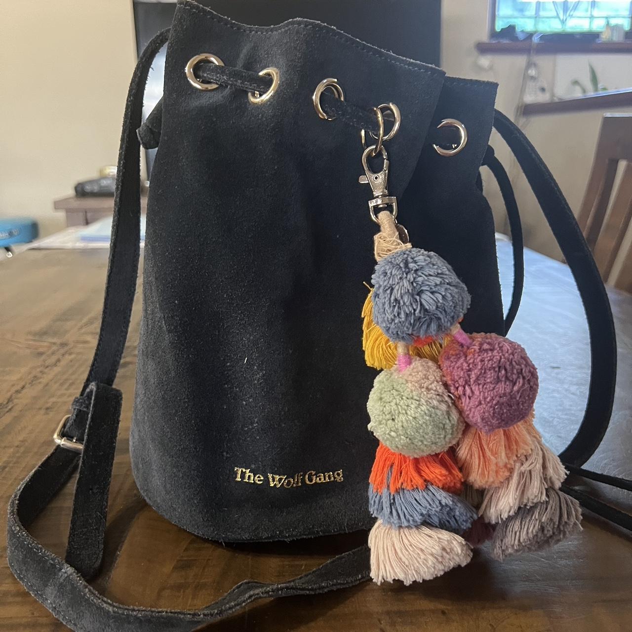 The Wolf Gang navy suade bag with draw string - Depop