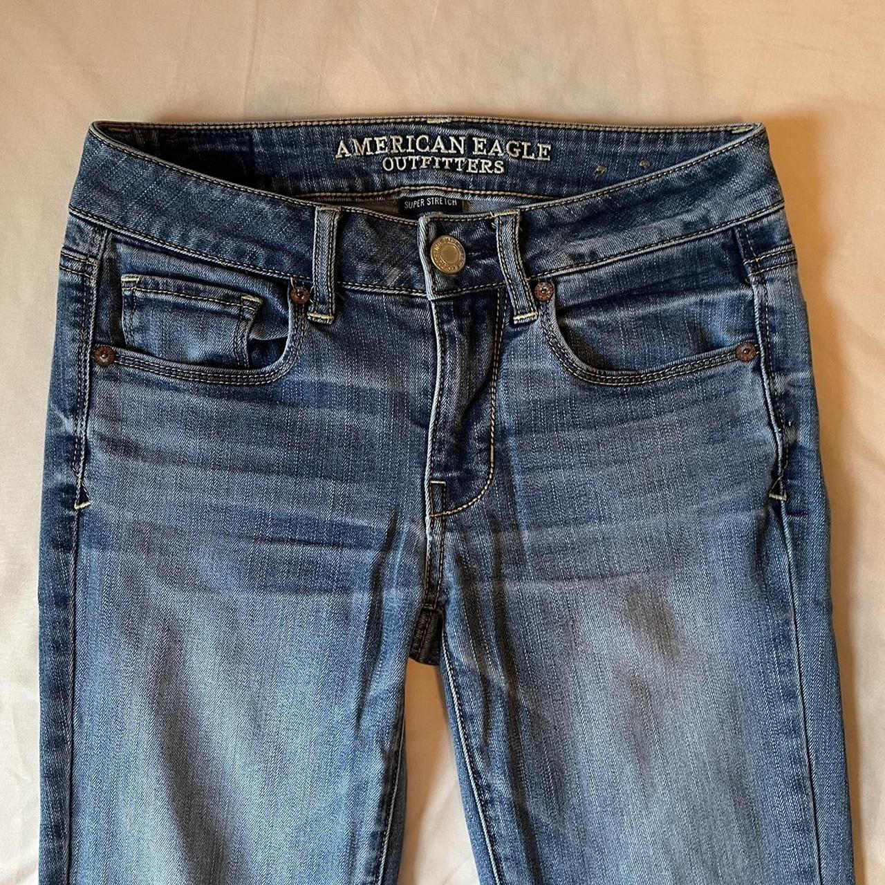 American eagle low rise medium wash stretchy bootcut... - Depop