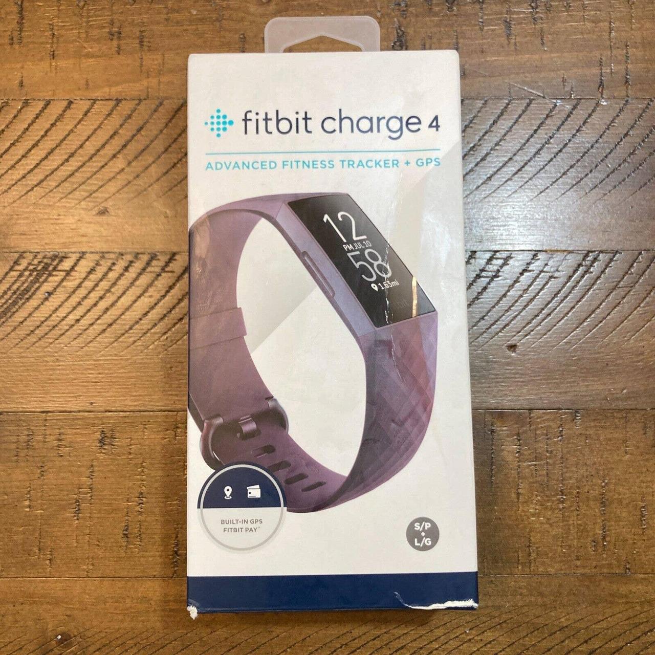 Fitbit Women's Purple Watch | Depop