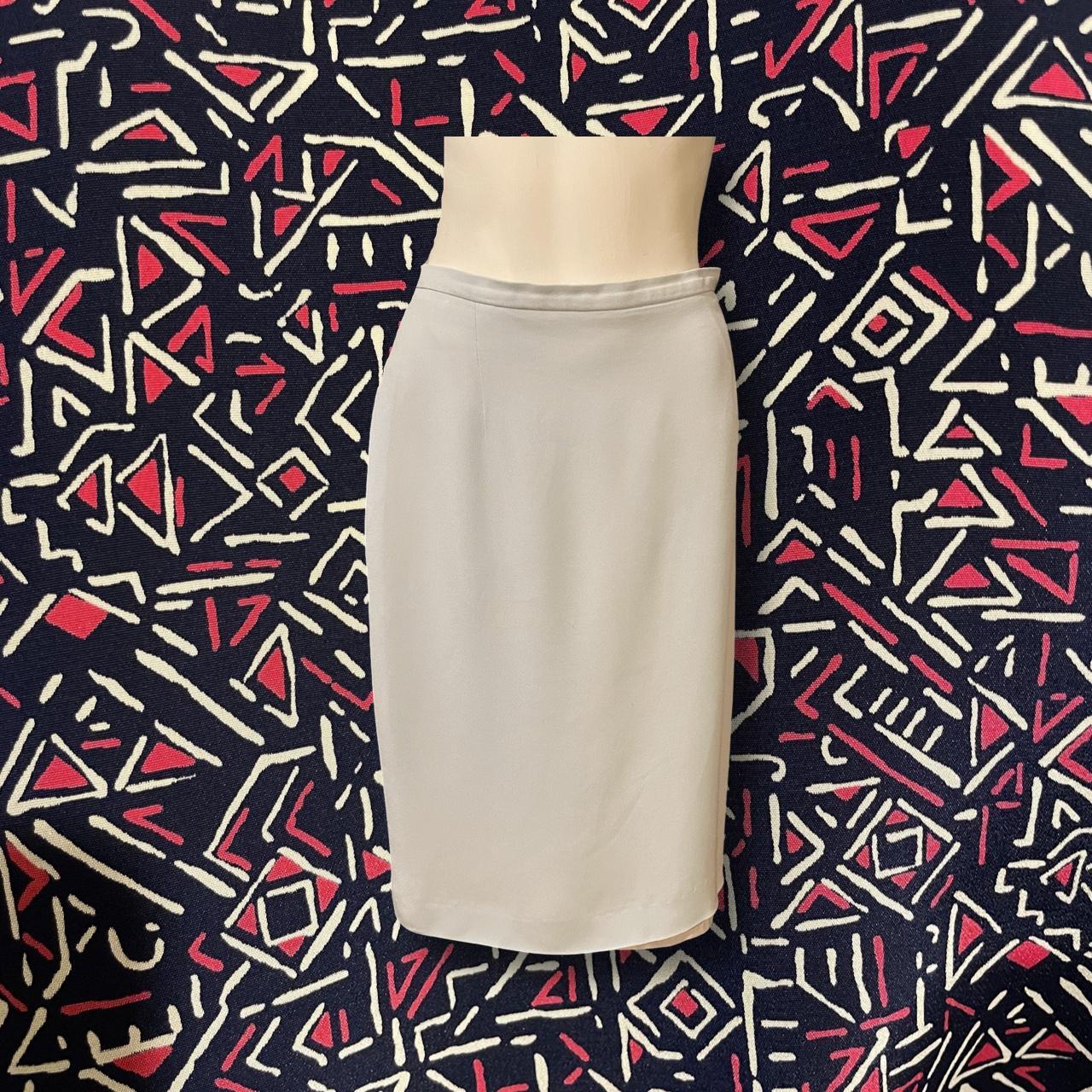 Vintage Jaeger pale blue pencil skirt. Viscose and... Depop