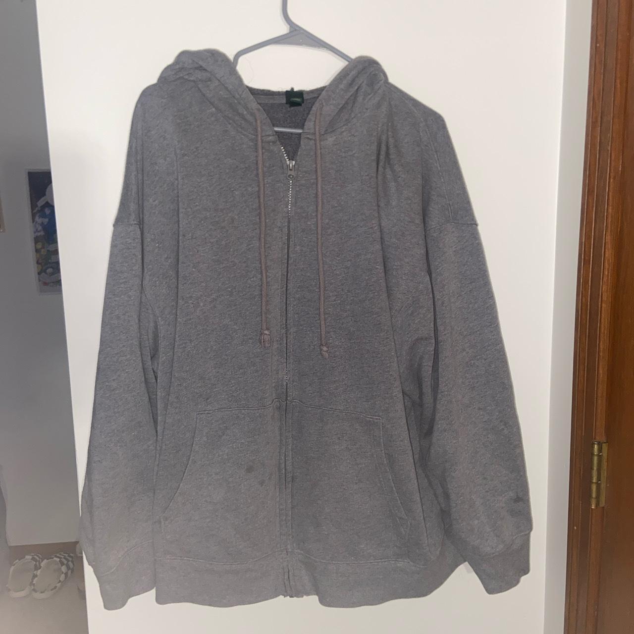 oversized grey zip up hoodie with some stains in... Depop