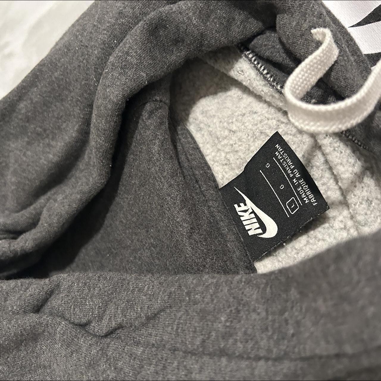 Barely worn grey Nike hoodie, has a small stain on... - Depop