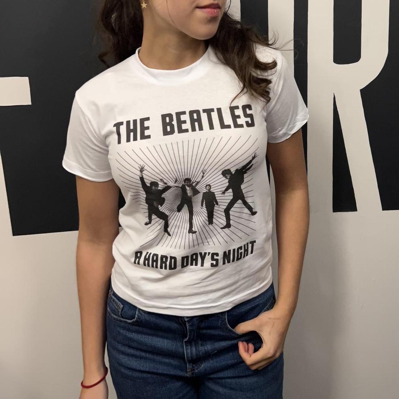 The Beatles baby t shirt Model is wearing a 5 6 100 Depop