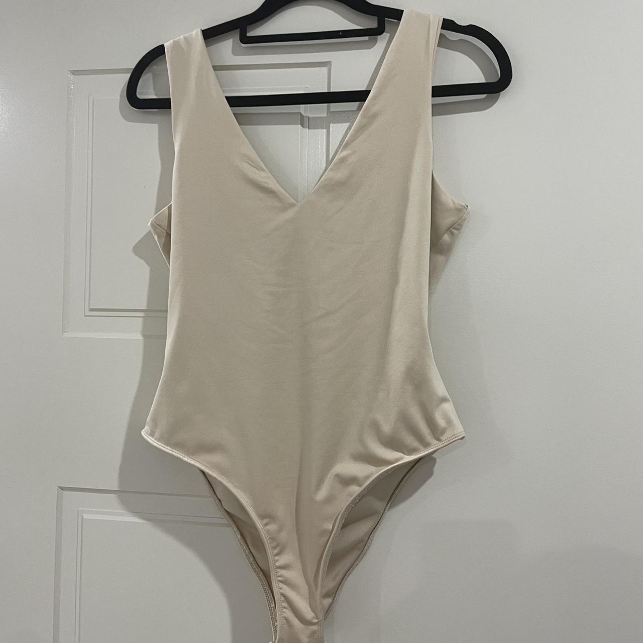 Showpo bodysuit with V neck, cream colour, excellent... - Depop