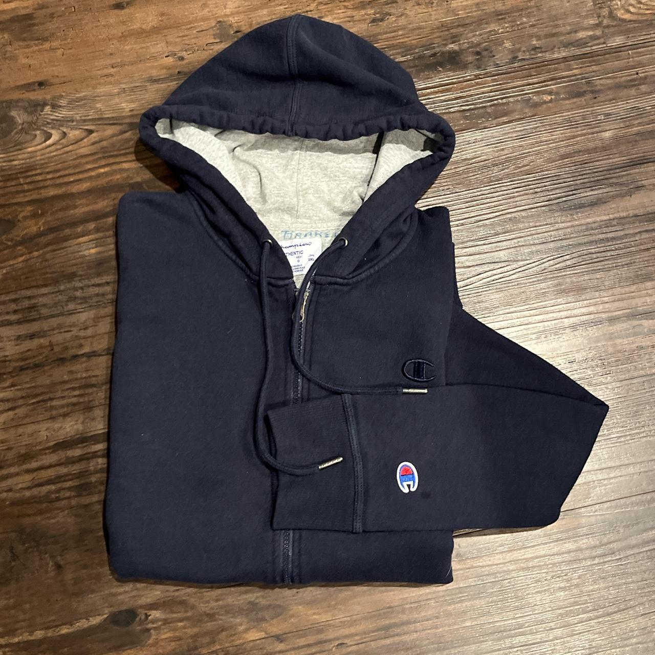 Dark blue Champion zip-up Hoodie Size: L Used... - Depop