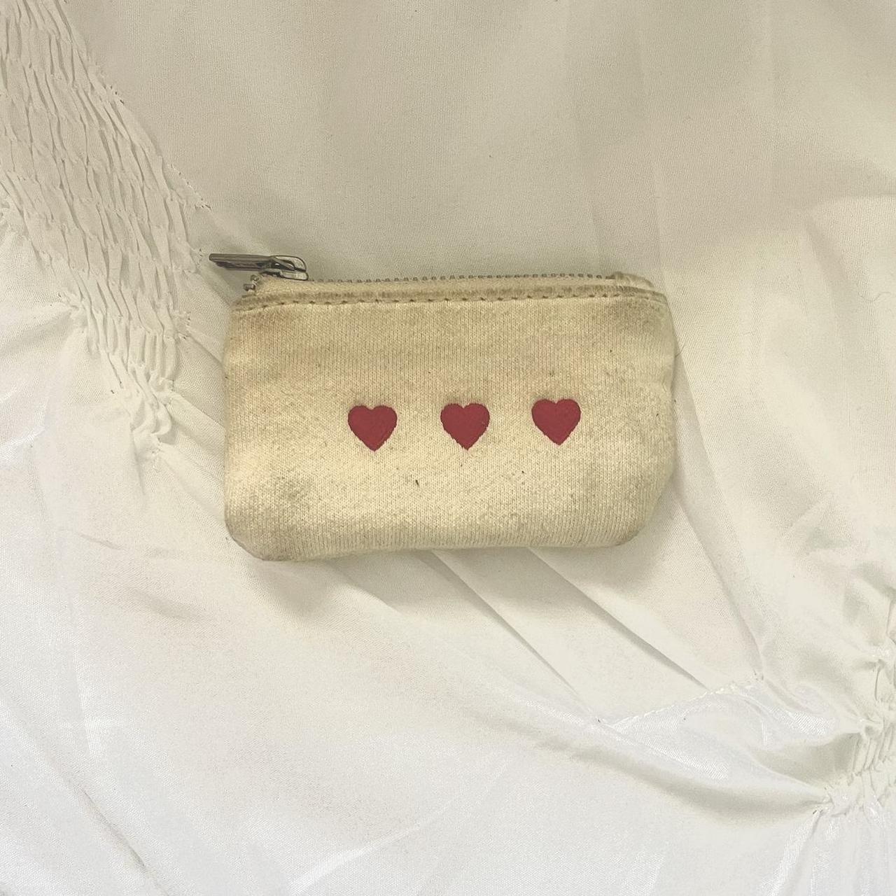 Brandy Melville three heart coin purse Depop... Depop