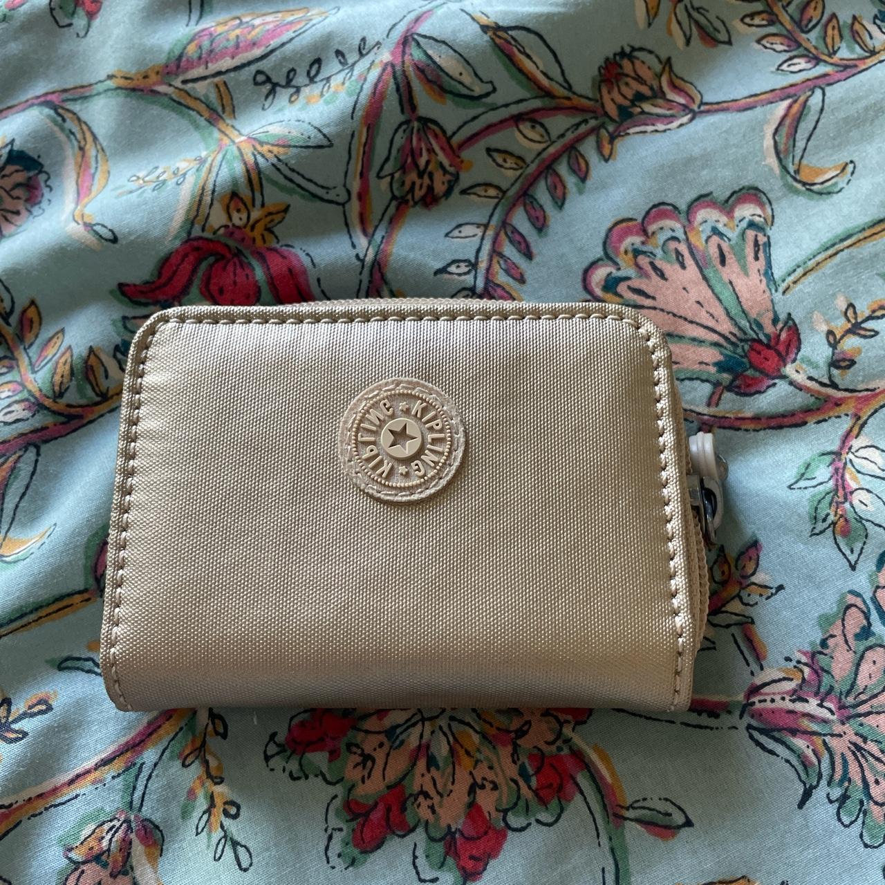 small Kipling wallet in metallic glow approx. 4x3... Depop