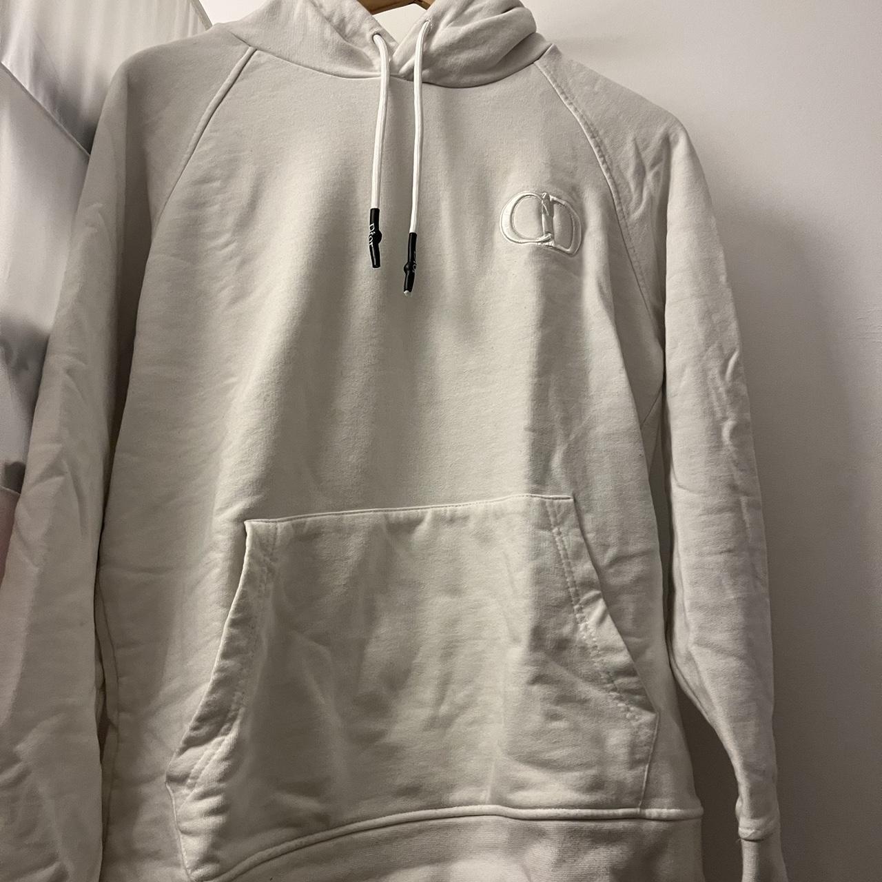 dior white hoodie only been worn a handful of... - Depop