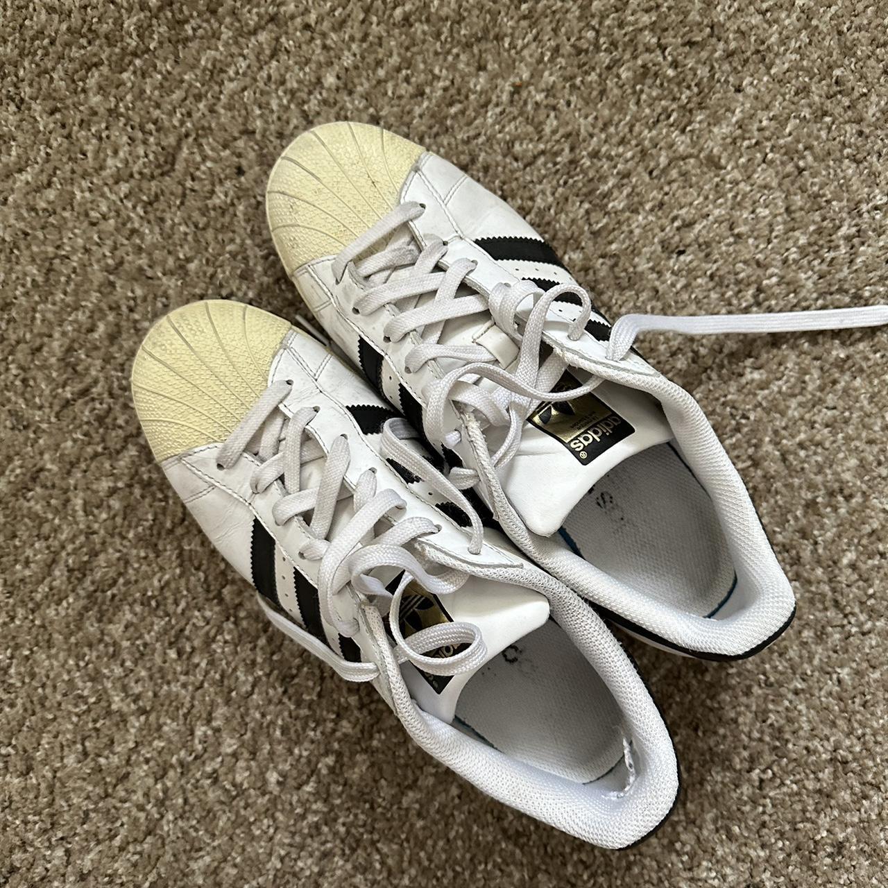 adidas superstars, yellowing on the front toes - Depop