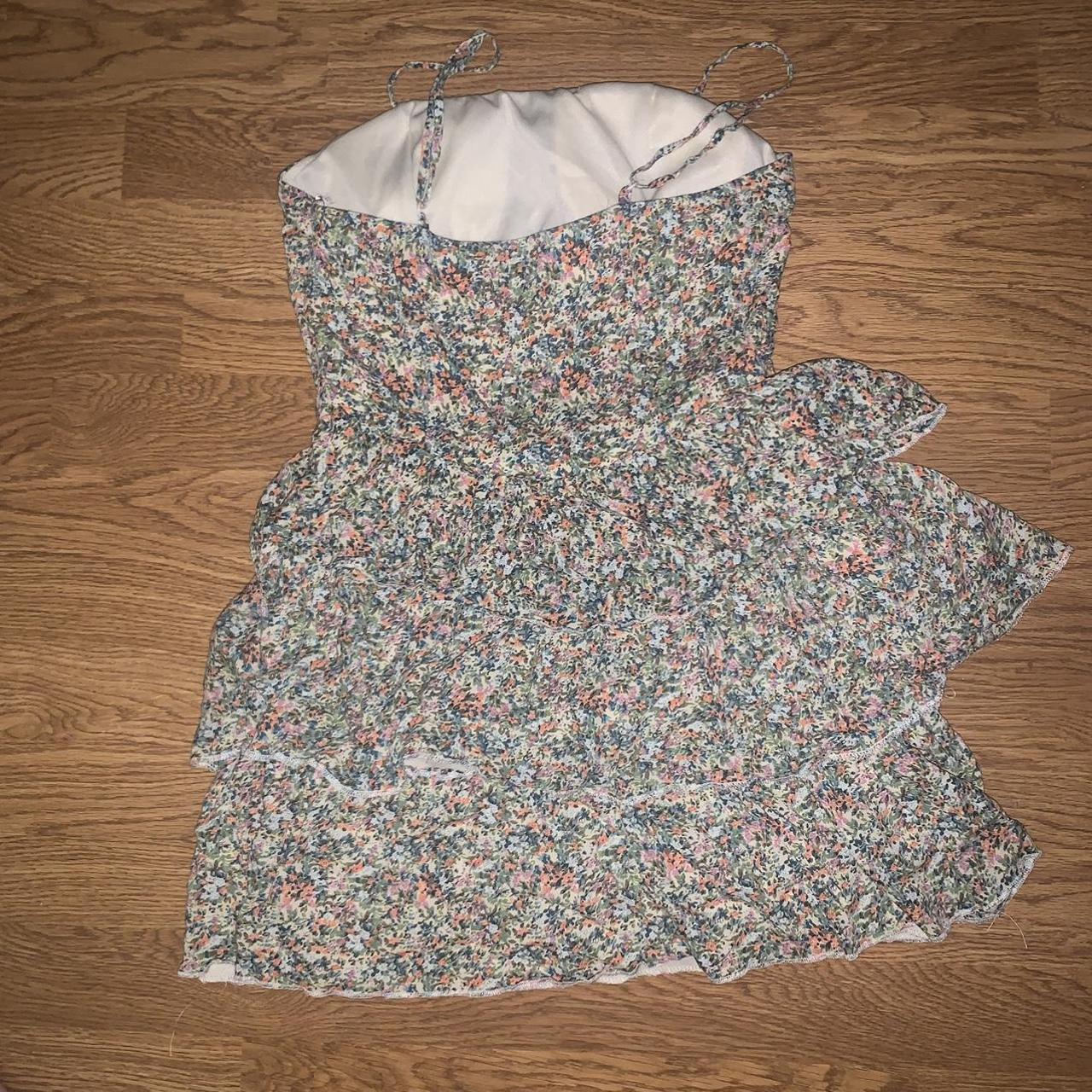 Flower print dress *it’s cut kind of small. I am... - Depop