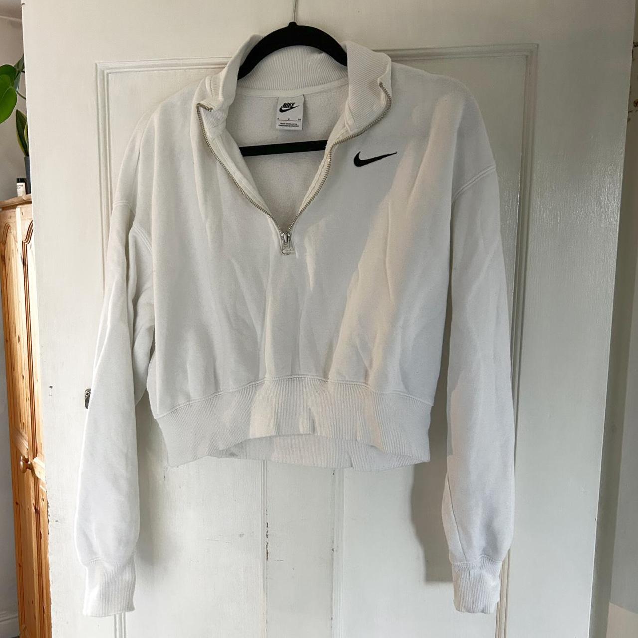 White cropped Nike half zip sweater. Worn but in Depop