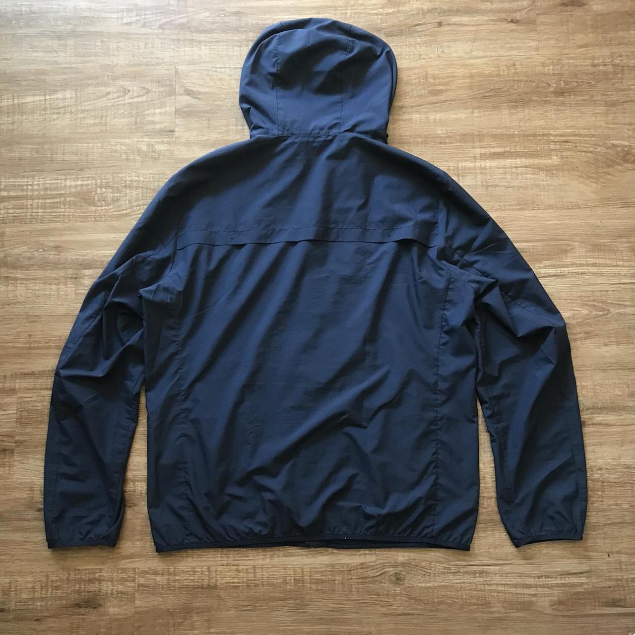 UNIQLO navy 100% polyester windbreaker Fits small | Depop