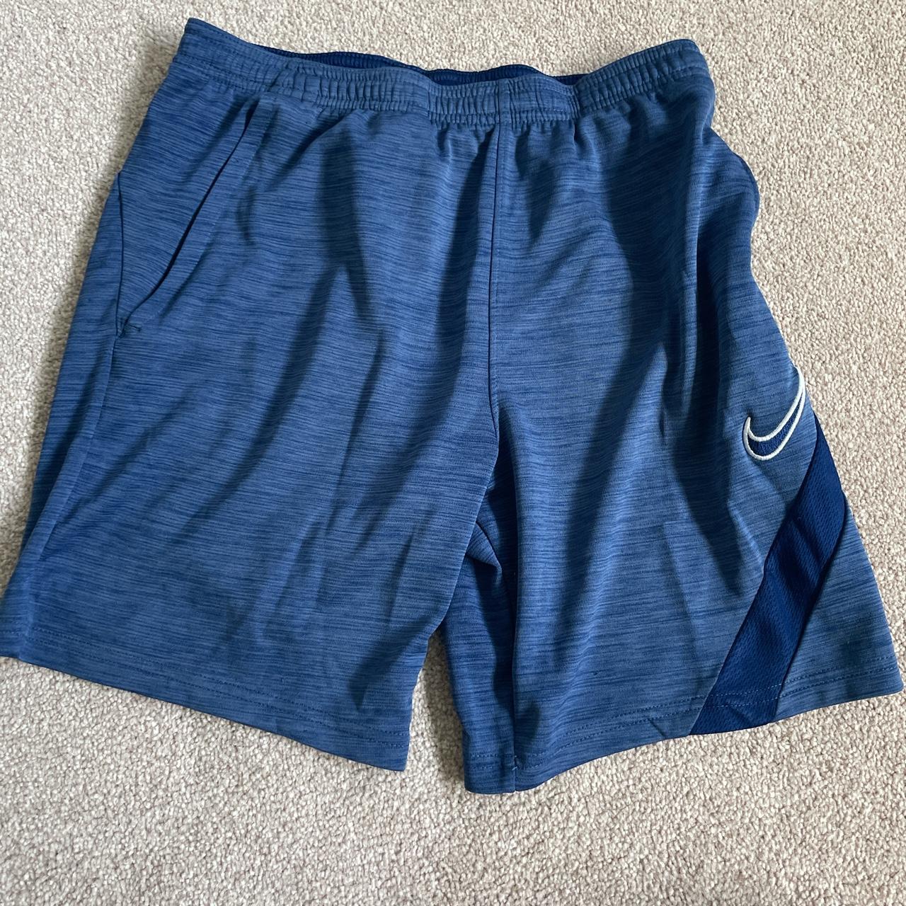Nike Dri fit shorts with zip pockets size large kids Depop