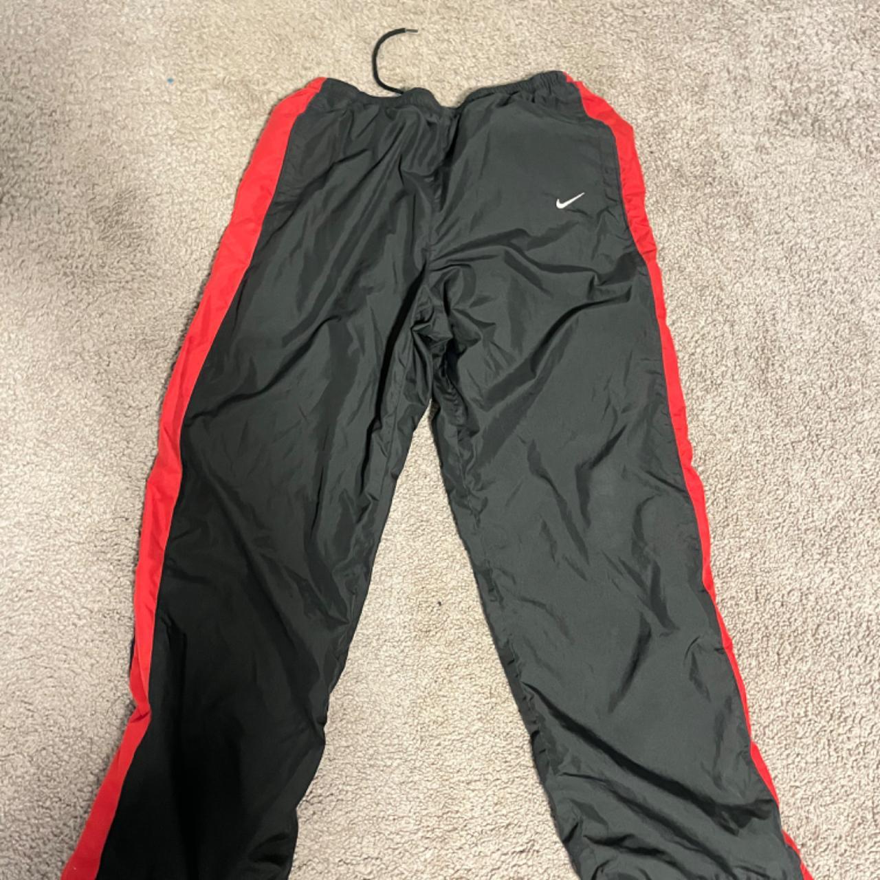 mens red nike track pants