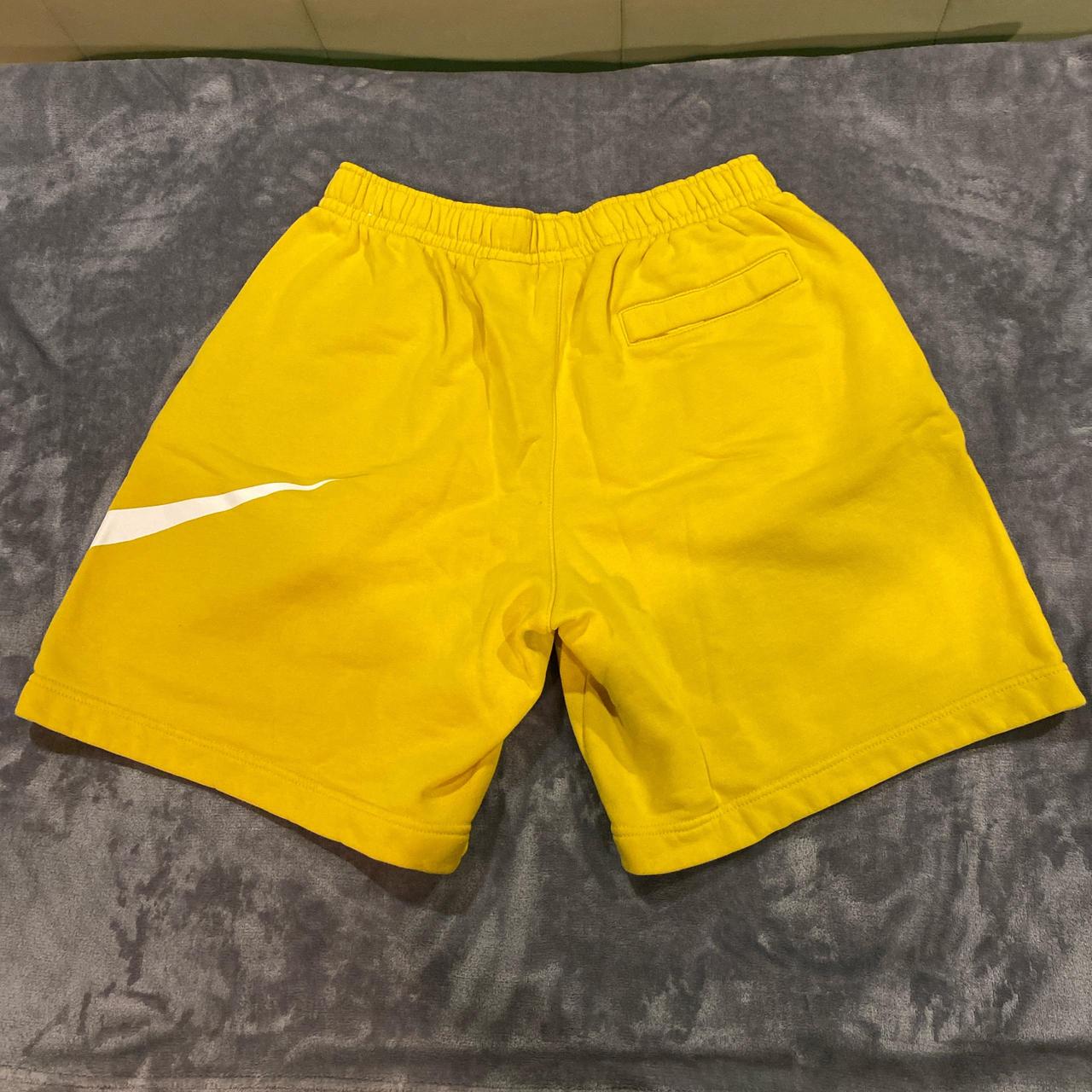 mens yellow nike shorts