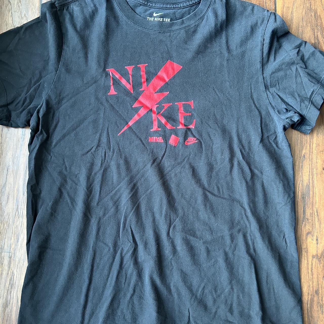 volt and black nike shirt