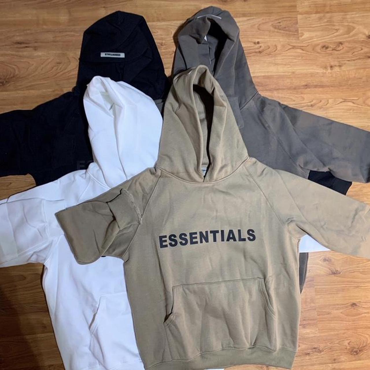 Essentials Men's Black and Cream Hoodie | Depop