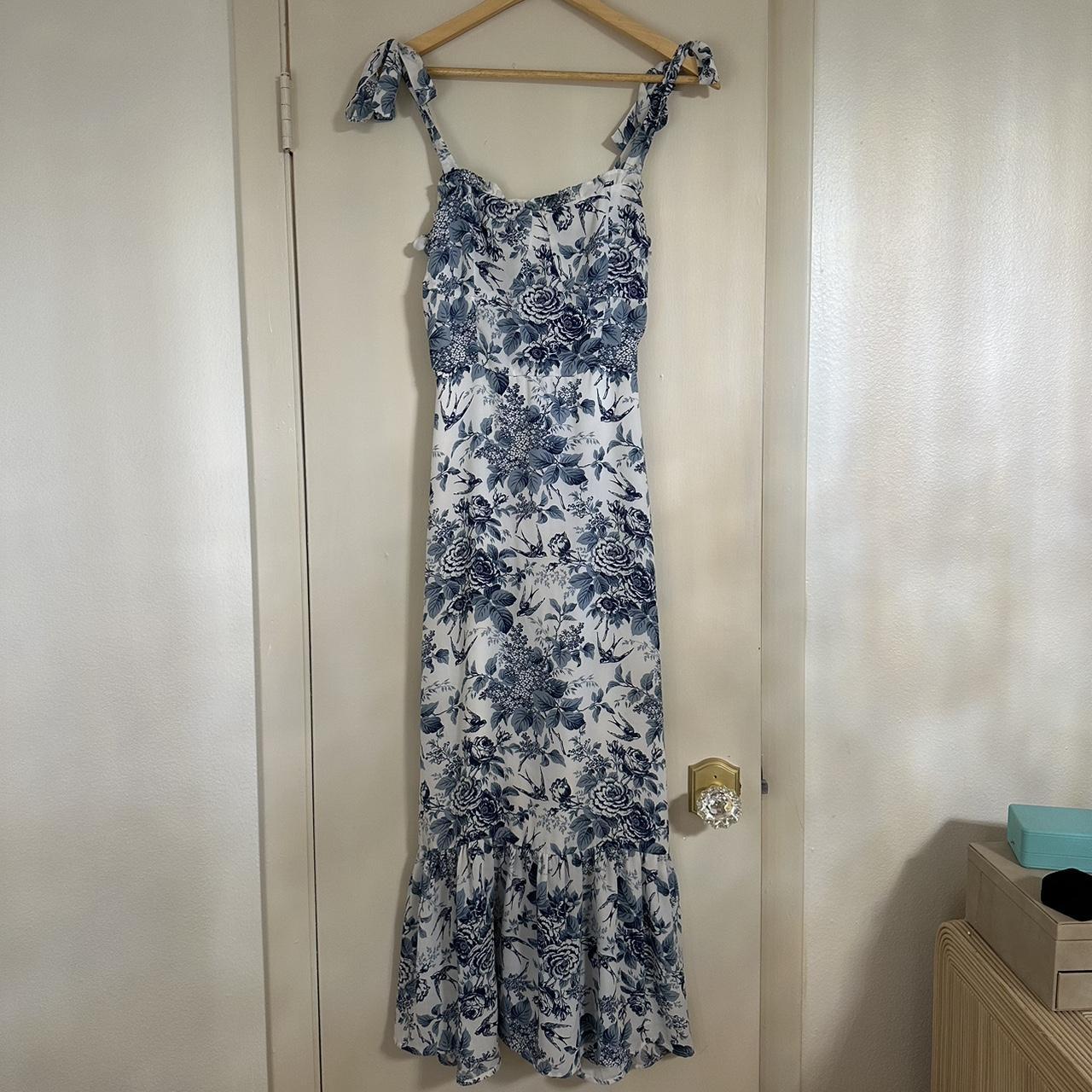 Blue and white floral midi dress with adjustable tie... - Depop