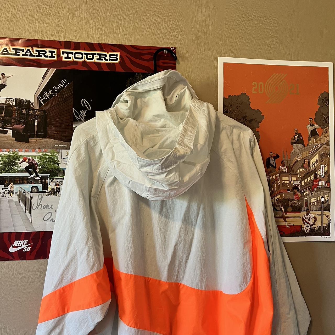 orange and white nike windbreaker