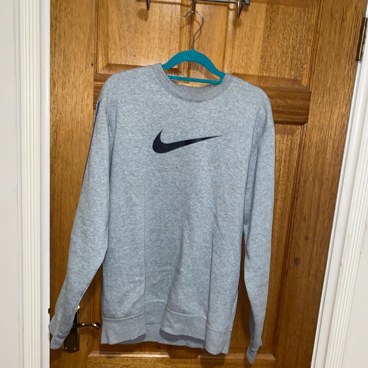 Grey sweatshirt with black Nike tick and blue... - Depop
