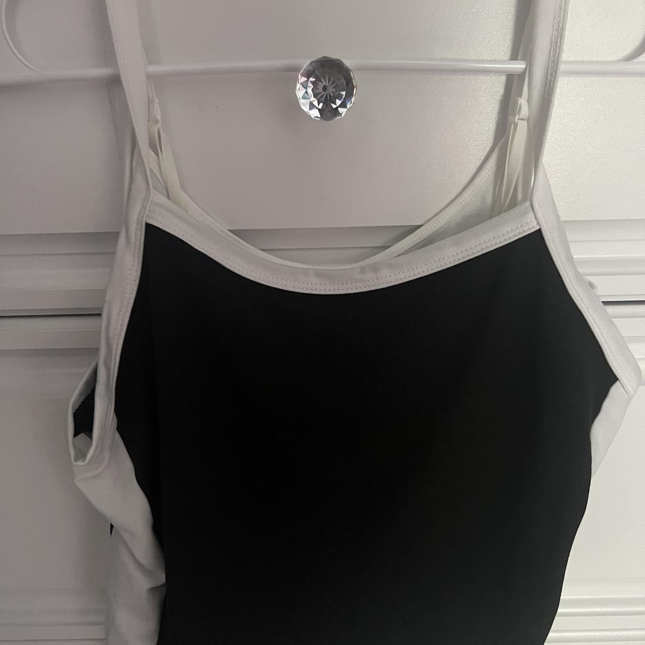 Black and white tank top size medium. - Depop