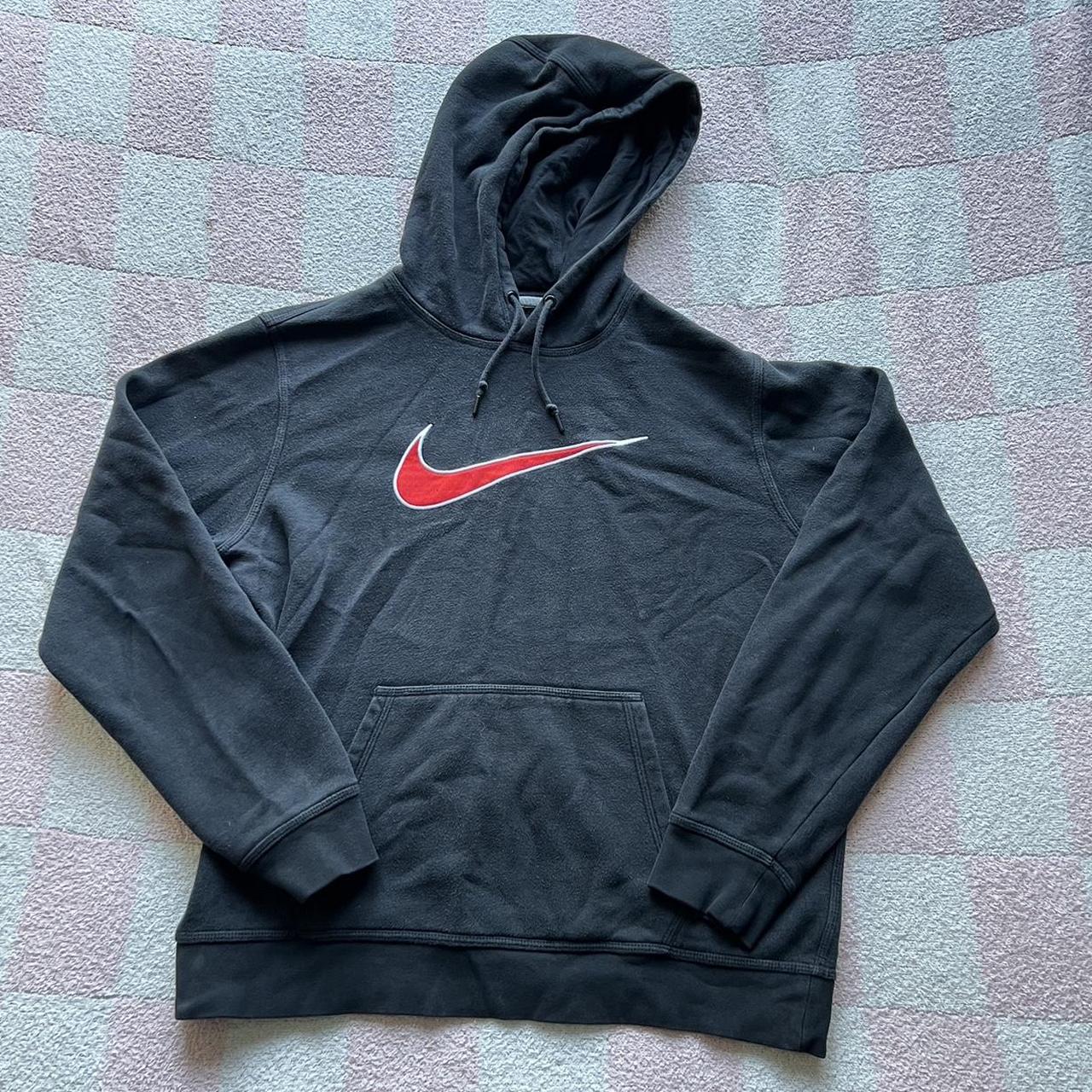 Black nike hoodie with red swoosh #nike #justdoit - Depop