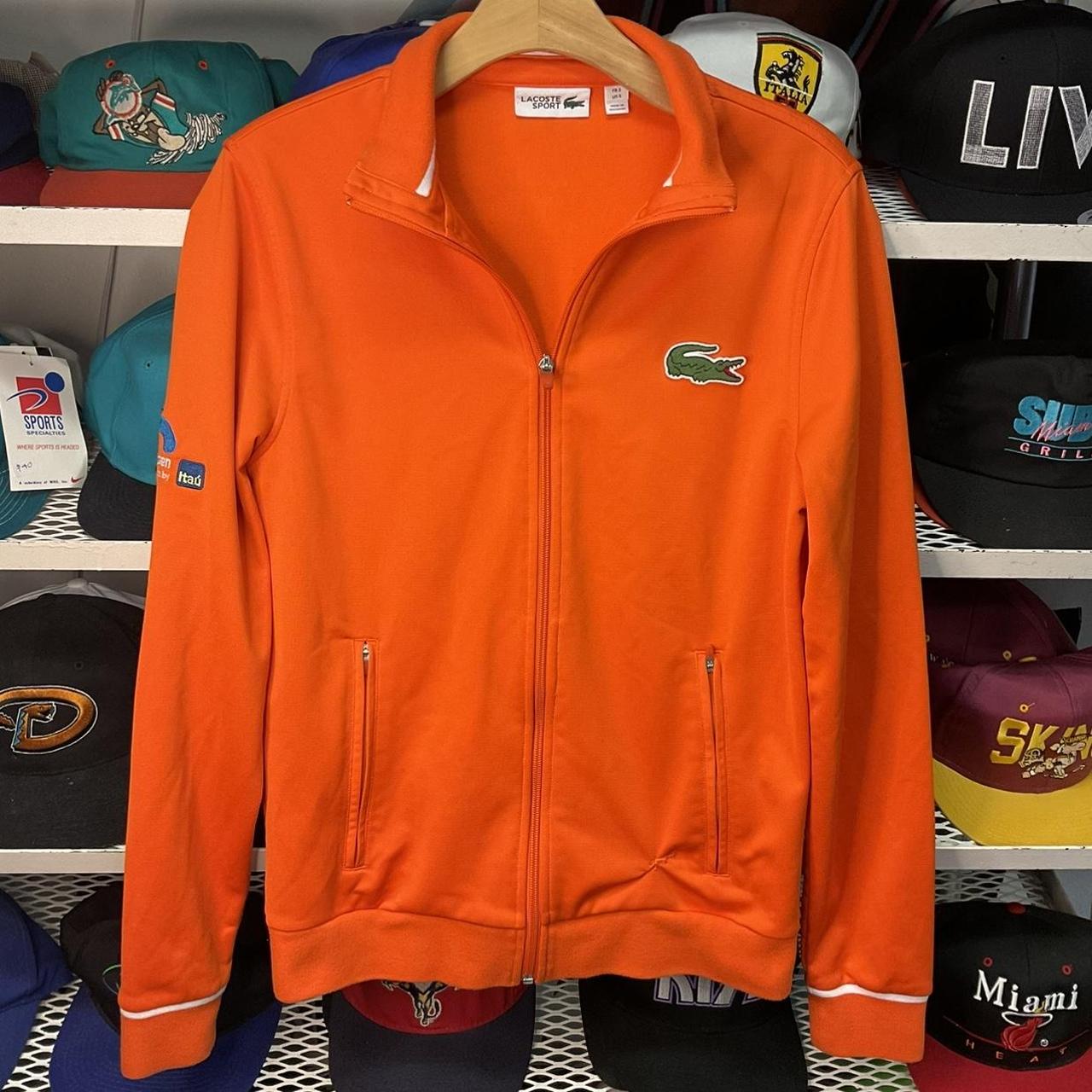 Orange Lacoste Zip up Track jacket sz... Depop