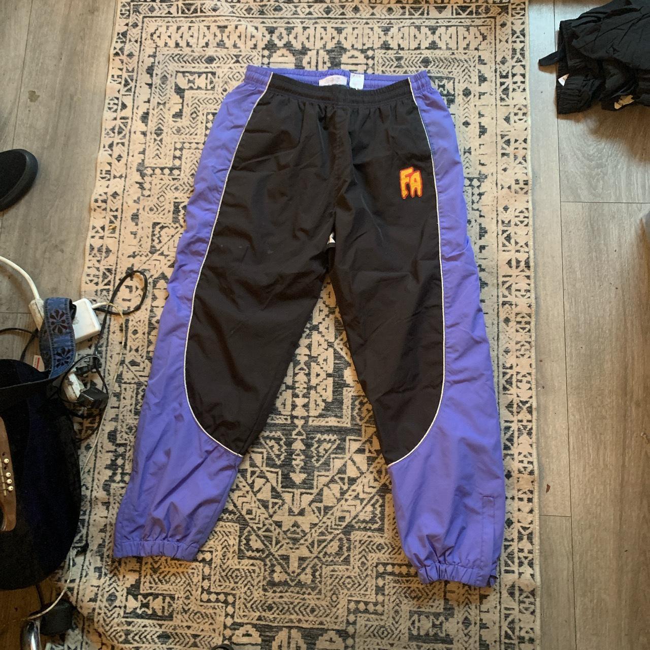 Fucking awesome track pants exclusive Has hole in... - Depop