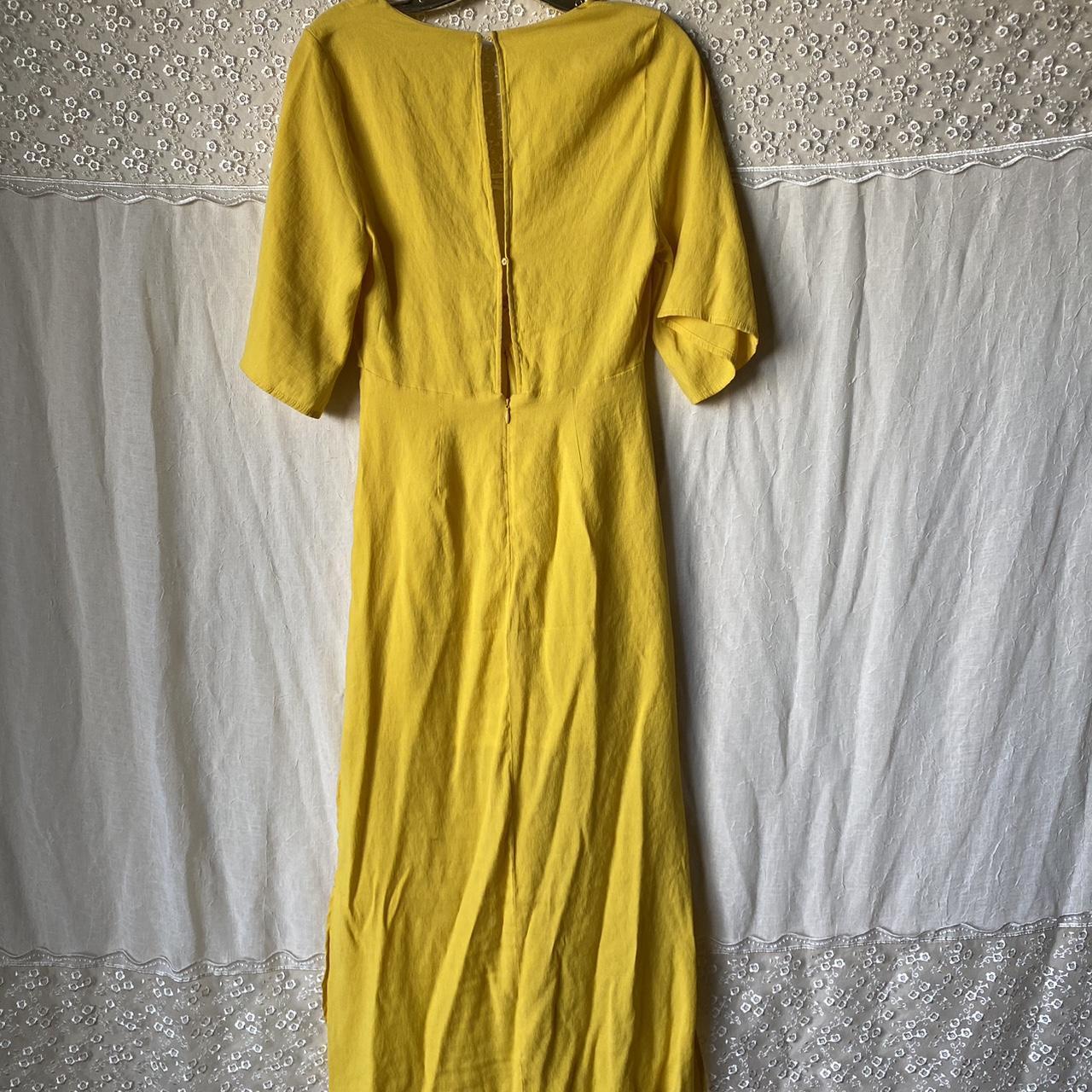 Yellow cutout maxi dress Wide sleeves Slits at... - Depop