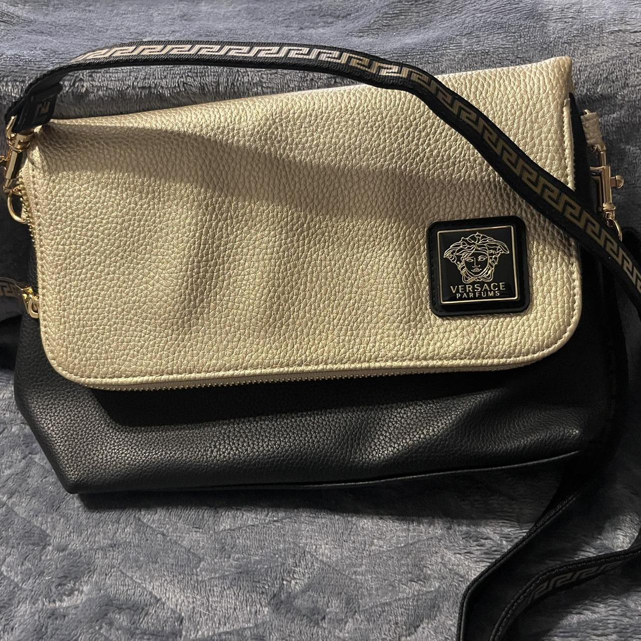 Pre-Loved Versace offers Parfume gold zip around wallet wristlet handbag