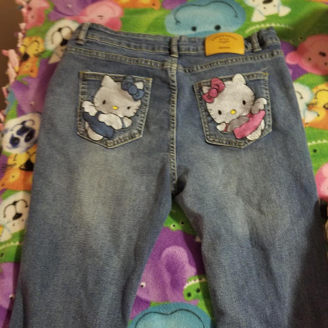 Low rise hello kitty Jean's has some stains on the... - Depop