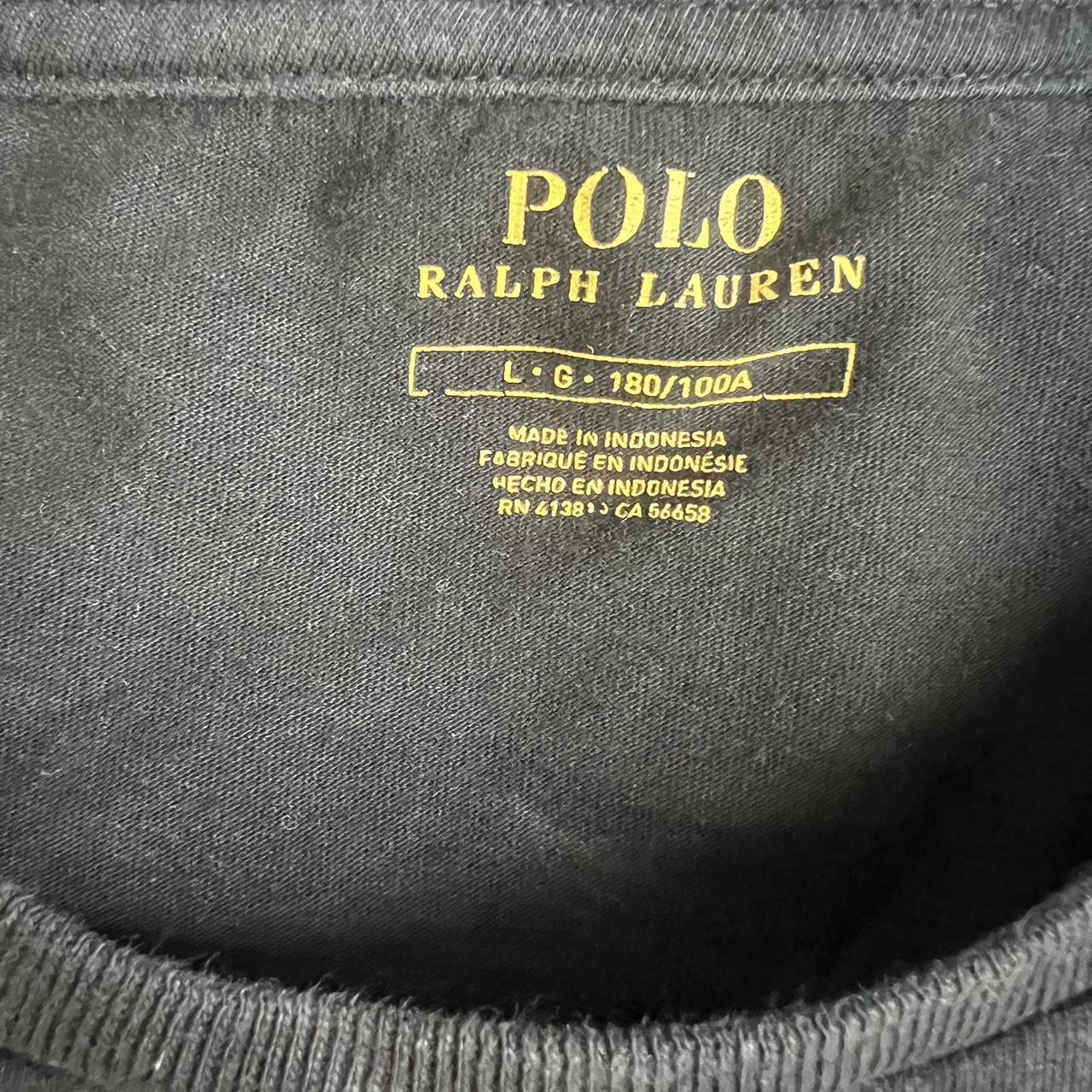 Black polo tee shirt with red emblem - Depop