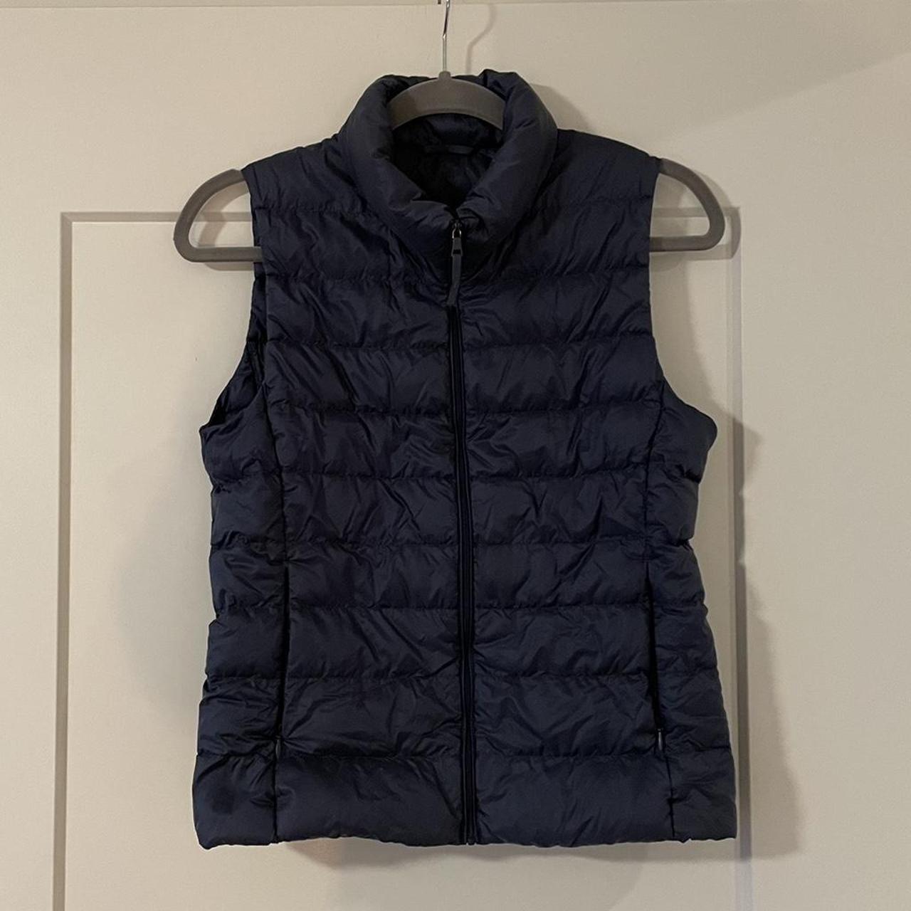 UNIQLO navy puffer vest, size small. Good condition Depop