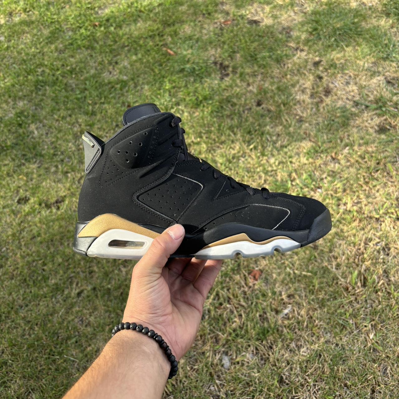 Jordan retro 6 black and gold on sale