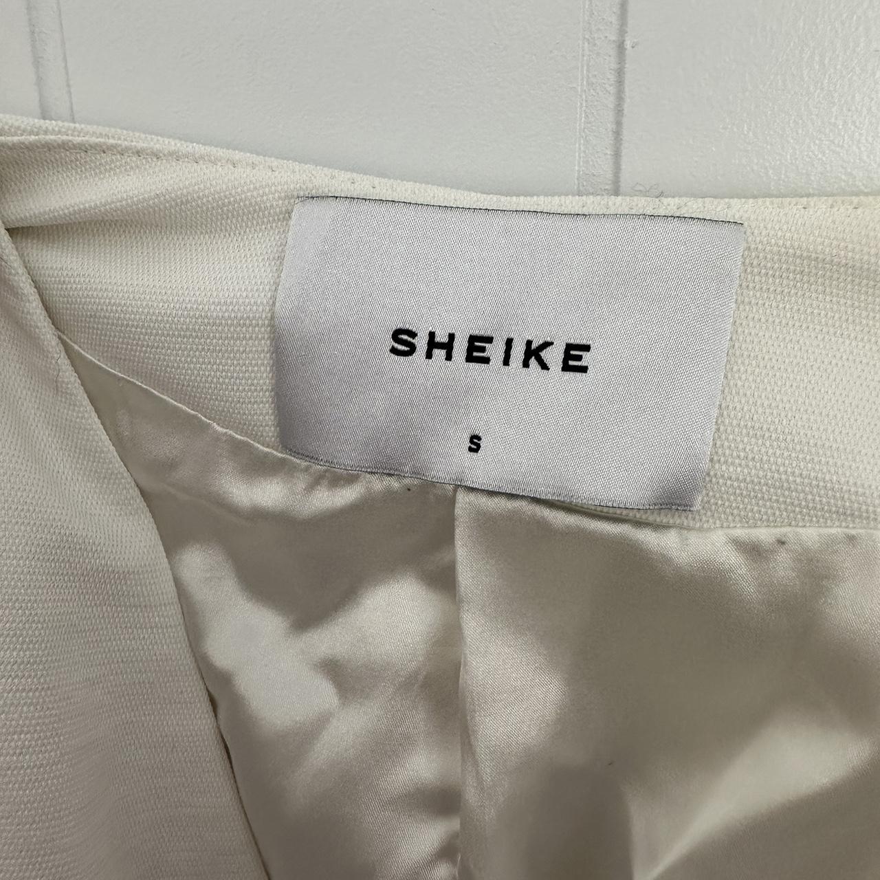 White Sheike sleeve capped jacket - Depop