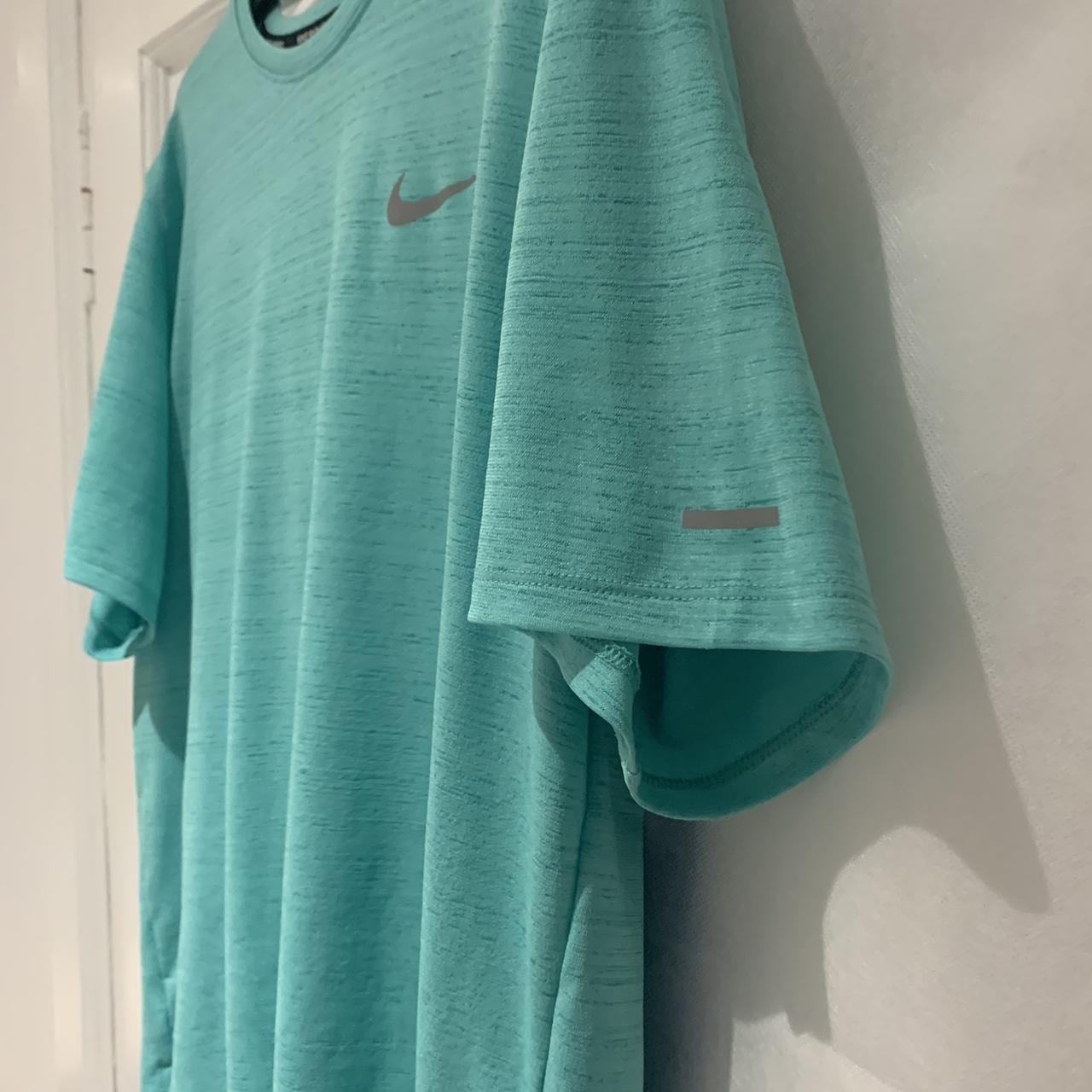 mint green nike miler running t shirt Depop
