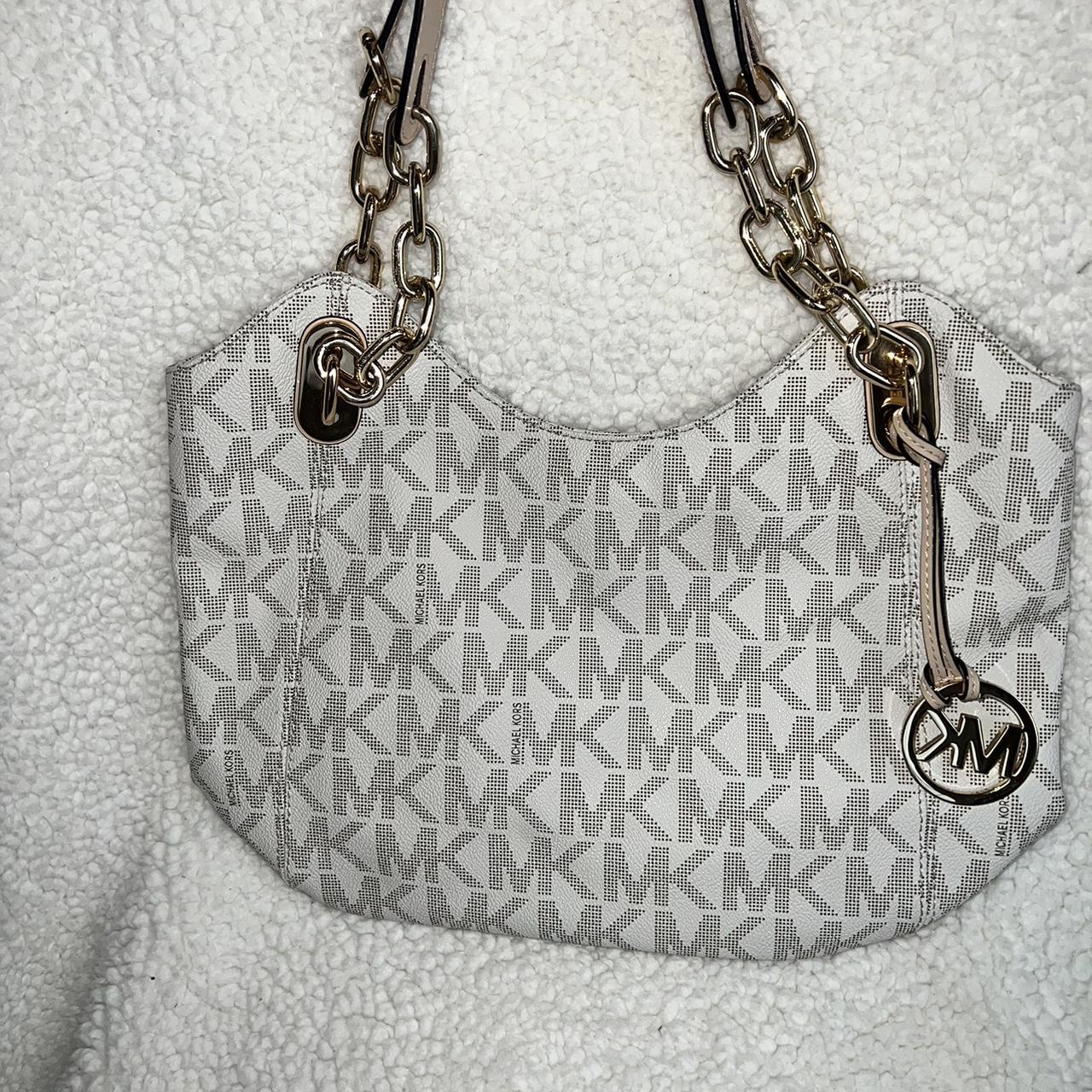 Michael Kors White and gold bucket purse. Minor