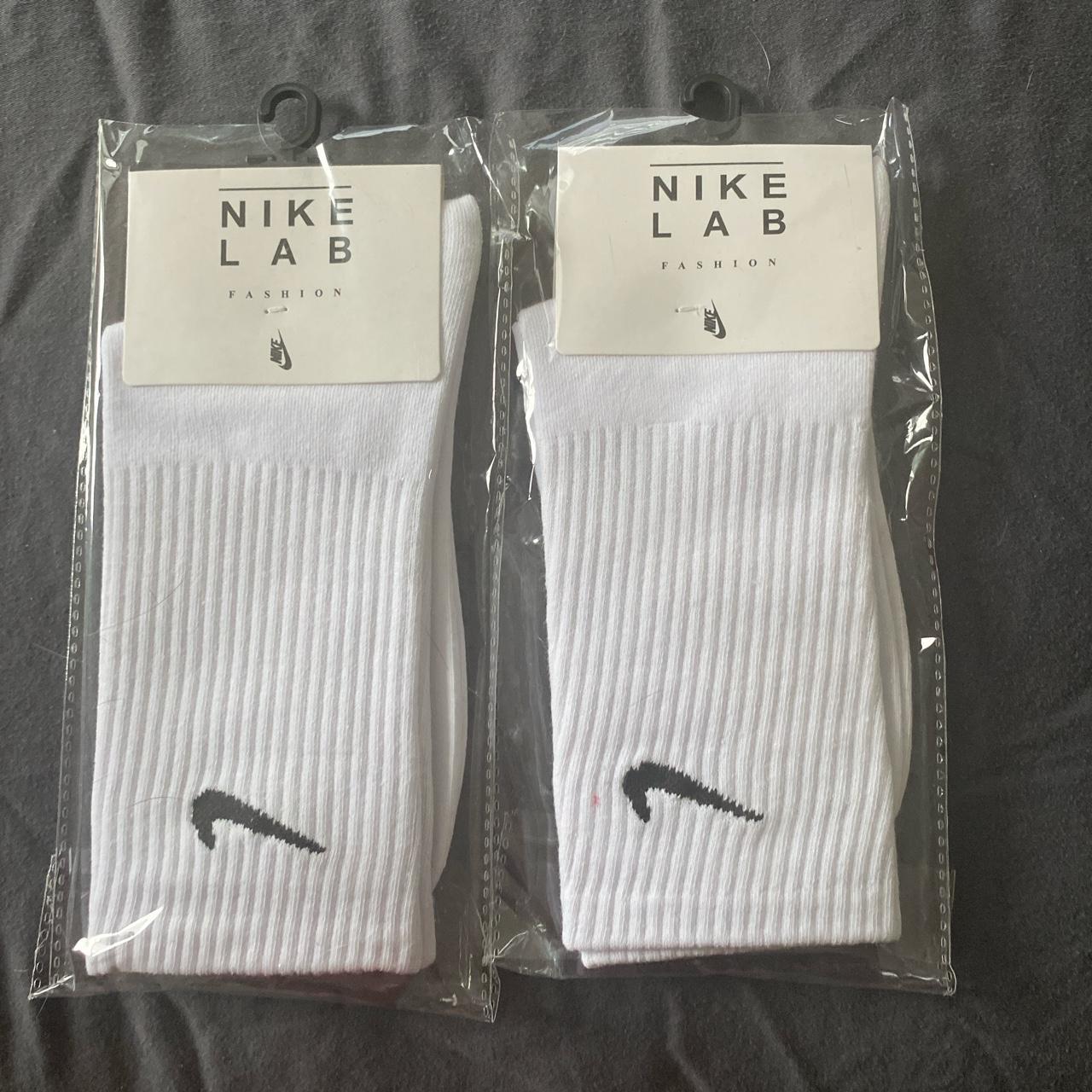 White Nike high socks still in original... Depop