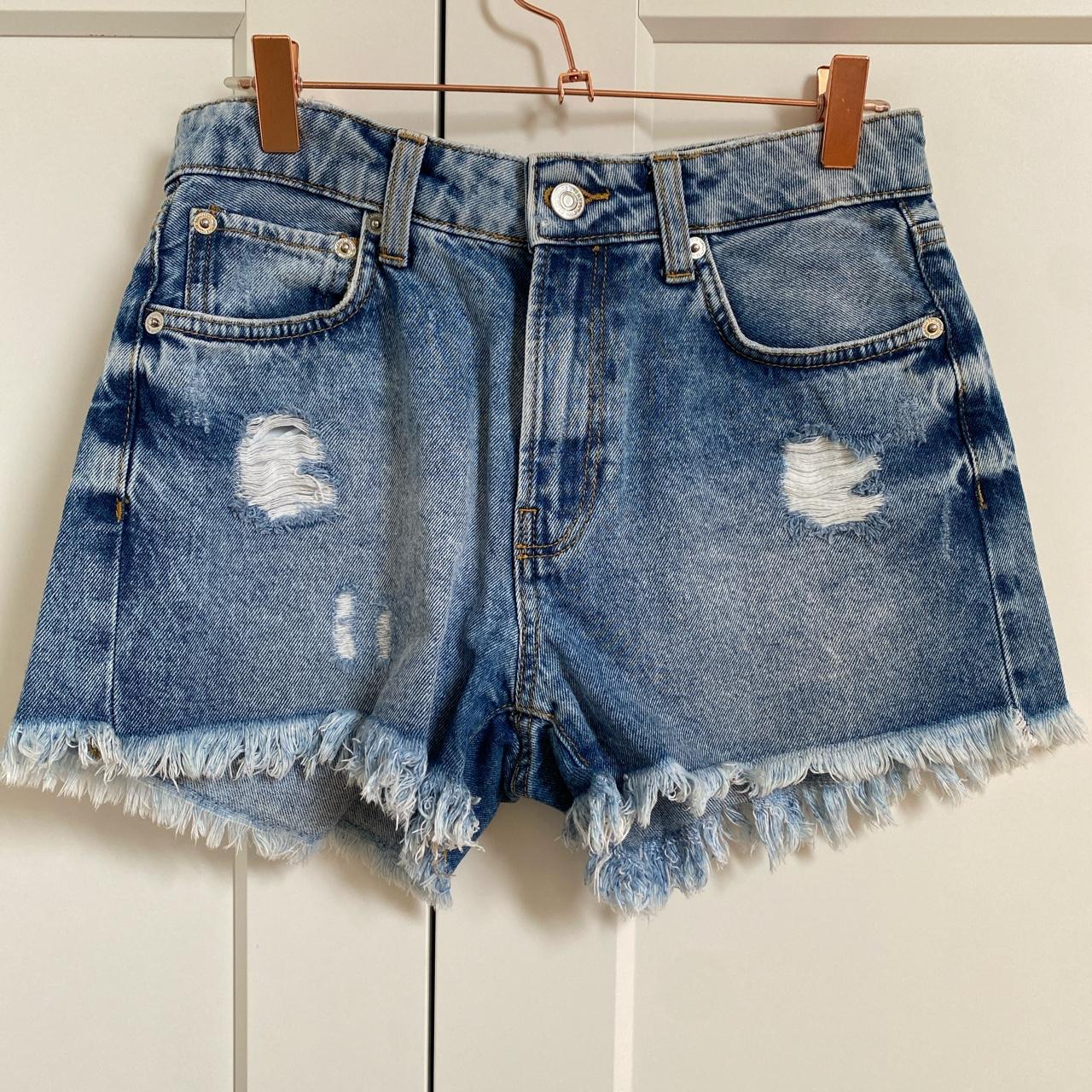 Blue denim shorts from Mango Rip details and... - Depop