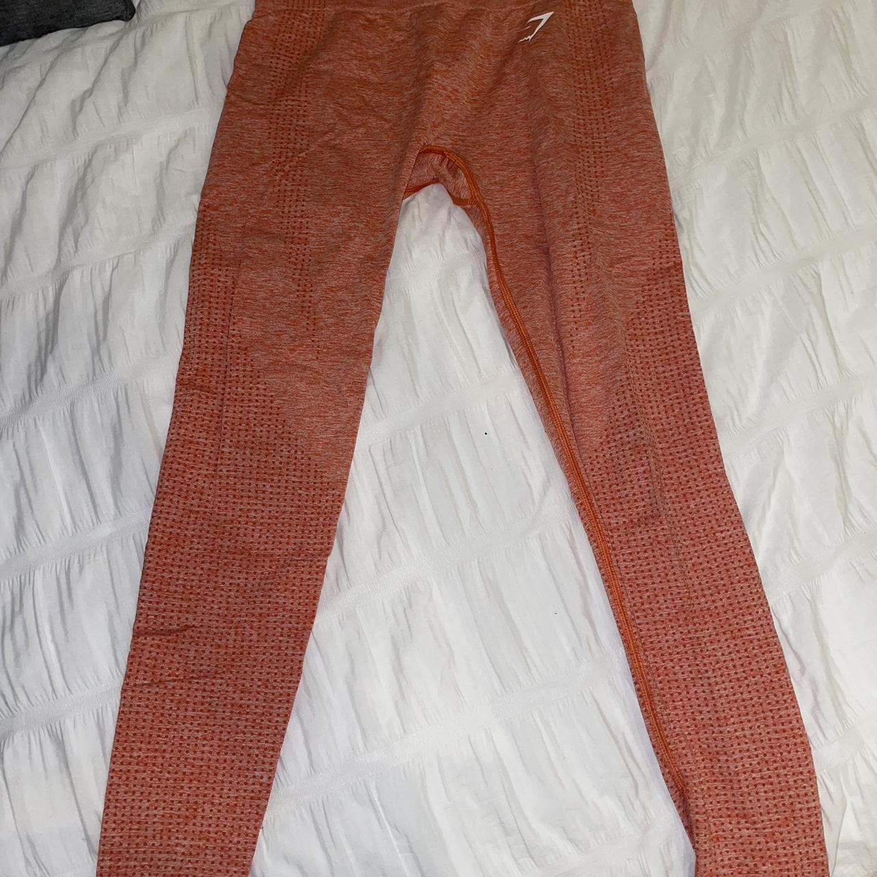 Orange gym shark leggings. Size S but tag is missing.